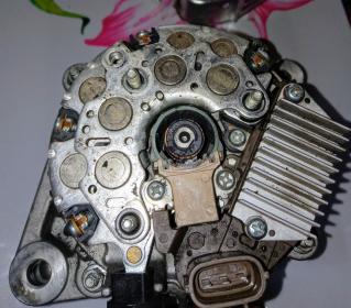 Click image for larger version

Name:	oex-alternator-opened.jpg
Views:	984
Size:	21.6 KB
ID:	750282